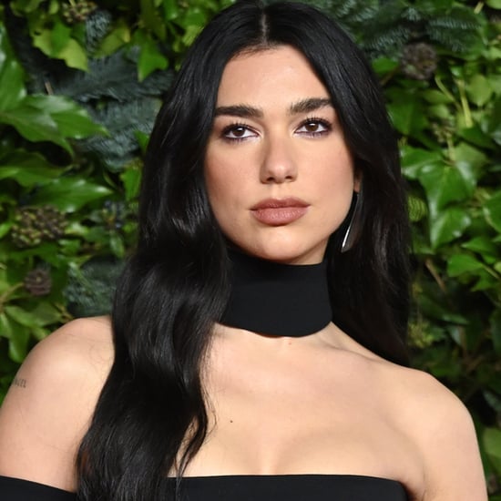 Dua Lipa's Sheer Bodysuit and Race-Car-Driver Outfit