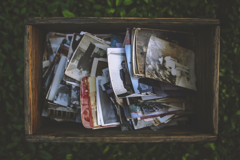 Organize old photos into an album.