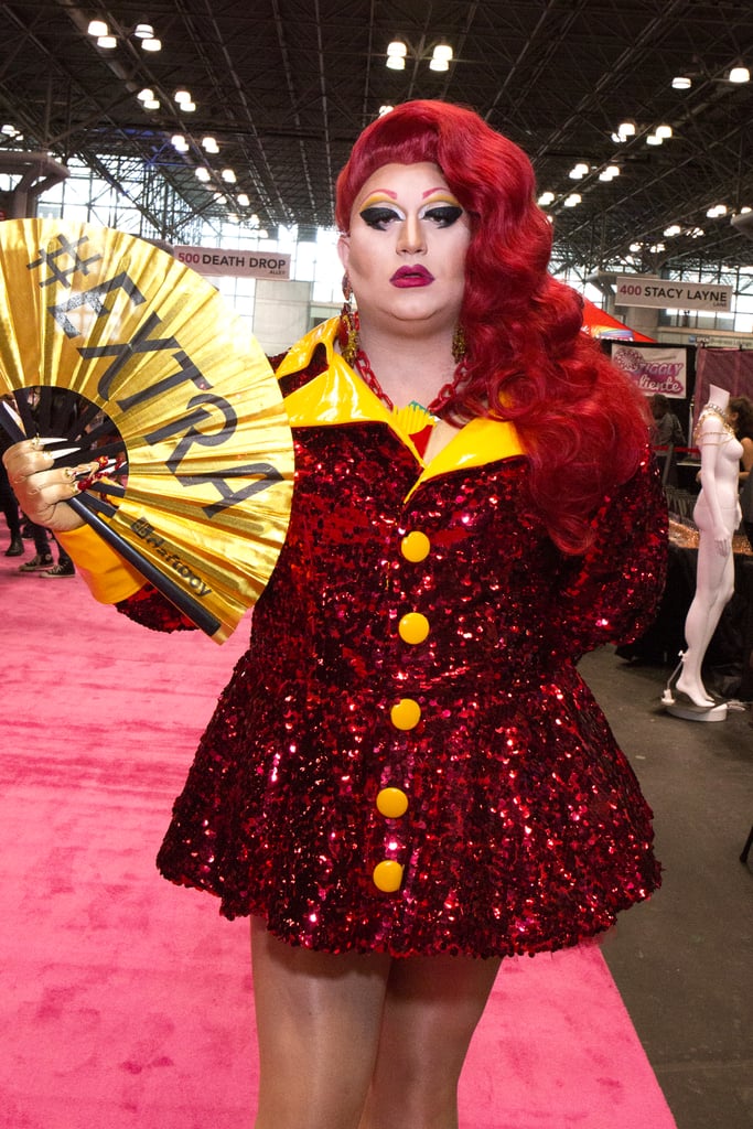 Alotta McGriddles attended DragCon with ruby mermaid waves and a bold red lip.
Alotta McGriddles attended DragCon with ruby mermaid waves and a bold red lip.