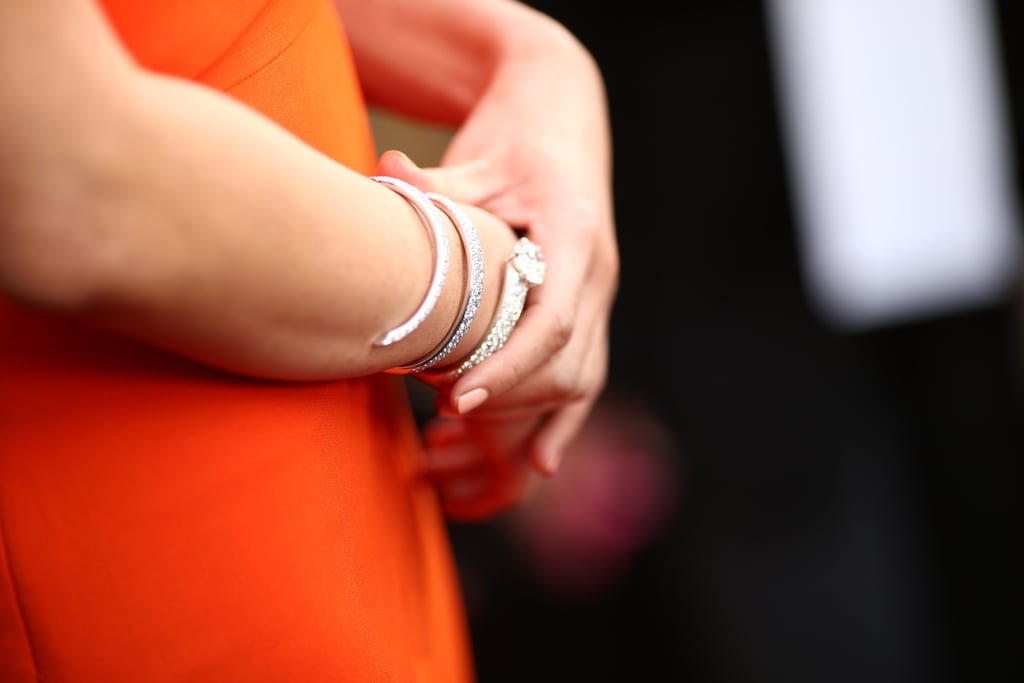 Olivia Munn Adjusting Her 12 Carat Forevermark Diamond Cuff Bracelet