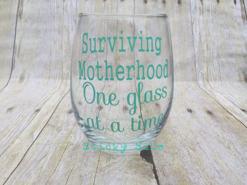 Surviving Motherhood Wine Glass