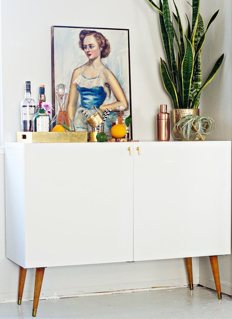 This Brittany Makes blogger managed to transform inexpensive Ikea cabinets into a swanky bar with retro appeal. Wait until you see the inside of the bar cabinet!
Source: Brittany Makes This Brittany Makes blogger managed to transform inexpensive Ikea cabinets into a swanky bar with retro appeal. Wait until you see the inside of the bar cabinet!
Source: Brittany Makes