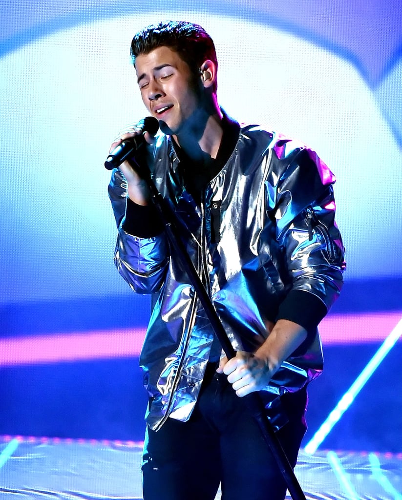 On the stage, numerous performances throttled the audience in the best way. Nick Jonas performed his hit song "Jealous," and we have to say, he looked (and sounded) better than ever.
Meghan Trainor and John Legend, on the other hand, slowed things down with a soulful rendition of "Like I'm Gonna Lose You." And Wiz Khalifa made us cry yet again with his Furious 7 song, "See You Again."
Remember Faith Hill? You surely will after you watch her singing "Girl Crush" with the band Little Big Town.