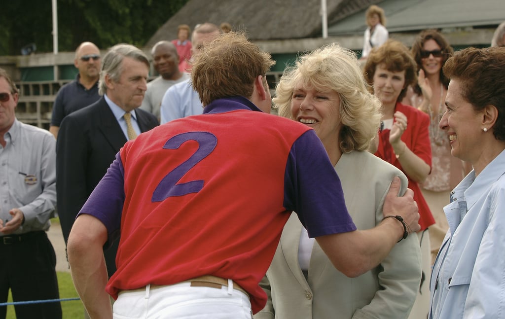 William greeted Camilla with a kiss during the Burberry Cup in England in June 2005.