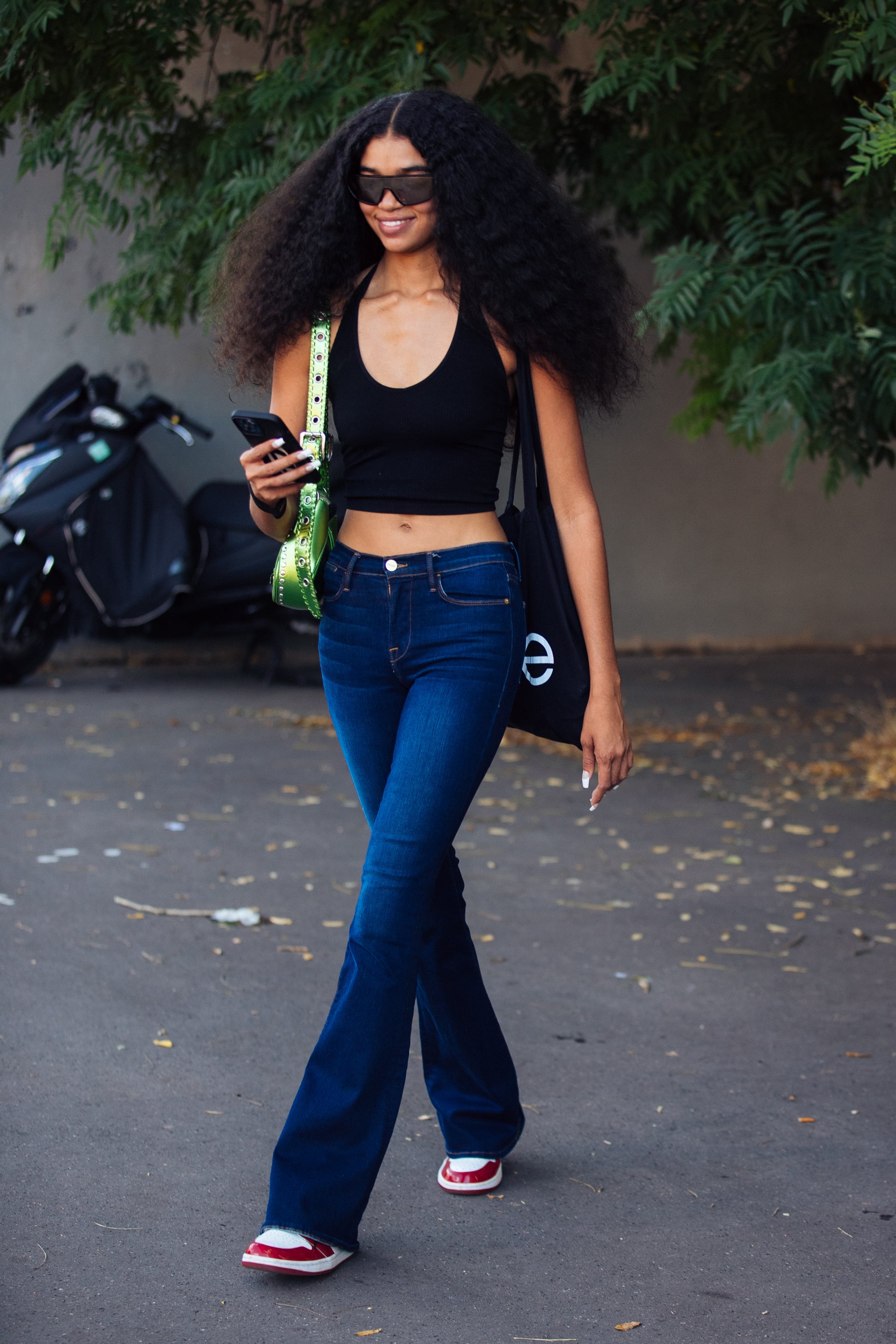 Retro 70s Vibe Outfit: Neon Crop Top with Bell Bottom Jeans