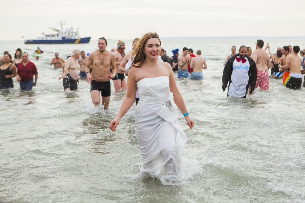 People kicked off 2014 with a chilly dip at Coney Island in NYC.