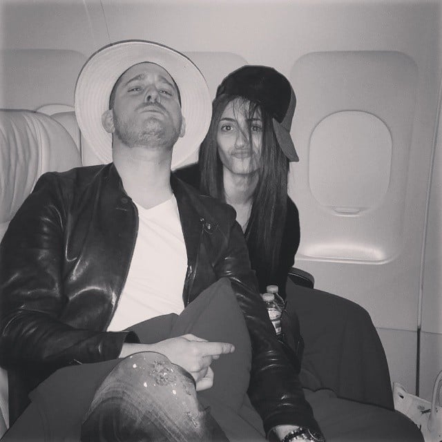 Emmy Rossum and Michael Bublé switched hats on a plane.
Source: Instagram user emmyrossum