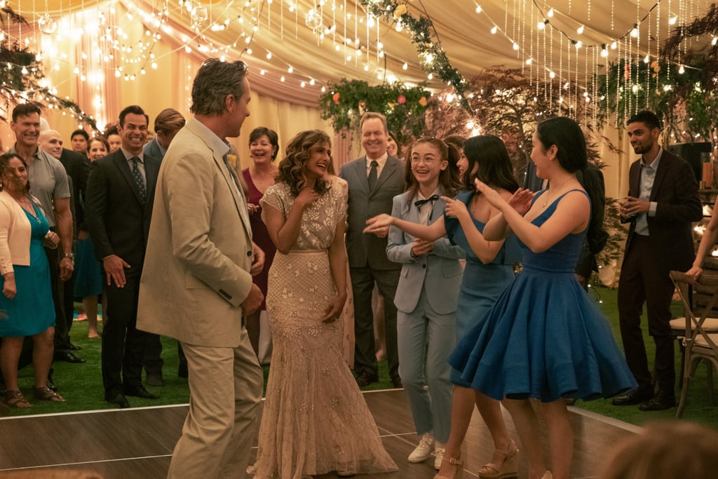 I'm not even dating anyone, but I'm adding a picture of this setup to my wedding Pinterest board. So cute!
Oof, this scene with Peter and his dad is a lot to take in.

OMG, the dog has a bow.

This wedding reception is giving me major William Weasley and Fleur Delacour wedding vibes.

Kitty playing matchmaker for Peter and Lara Jean right until the very end.

Oh no, the music is getting soft and so am I.

Here come the tears!