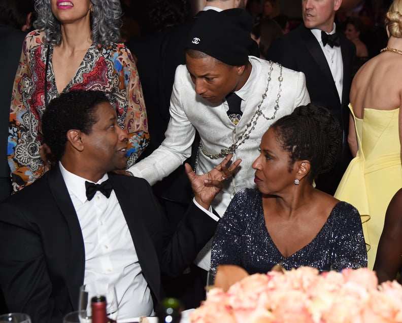 Pharrell Williams stopped to chat with Denzel Washington and his wife, Pauletta.