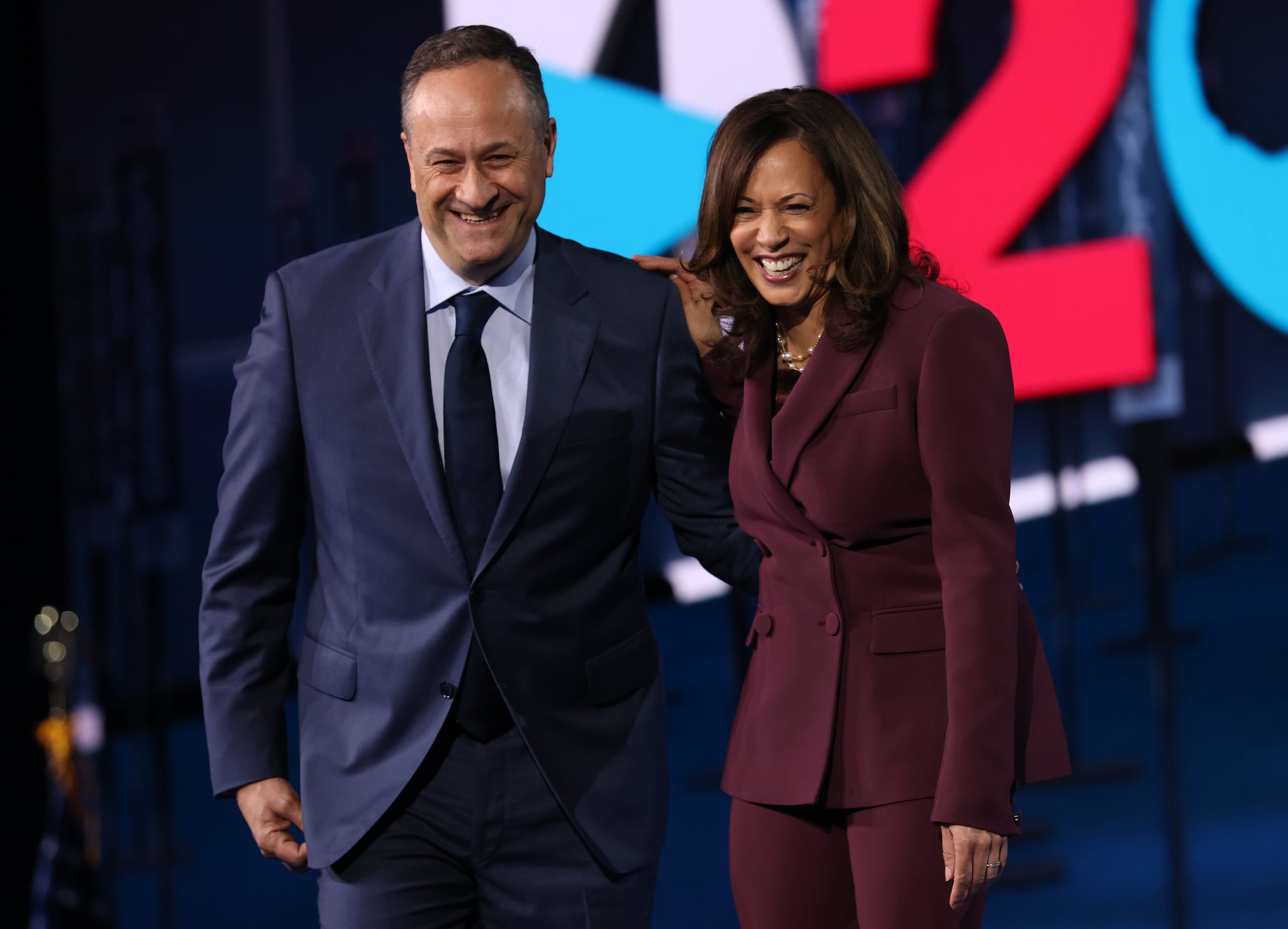WILMINGTON, DELAWARE - AUGUST 19:  Democratic vice presidential nominee U.S. Sen. Kamala Harris (D-CA) and her husband Douglas Emhoff appear on stage after Harris delivered her acceptance speech on the third night of the Democratic National Convention from the Chase Center August 19, 2020 in Wilmington, Delaware. The convention, which was once expected to draw 50,000 people to Milwaukee, Wisconsin, is now taking place virtually due to the coronavirus pandemic. Harris is the first African-American, first Asian-American, and third female vice presidential candidate on a major party ticket. (Photo by Win McNamee/Getty Images)