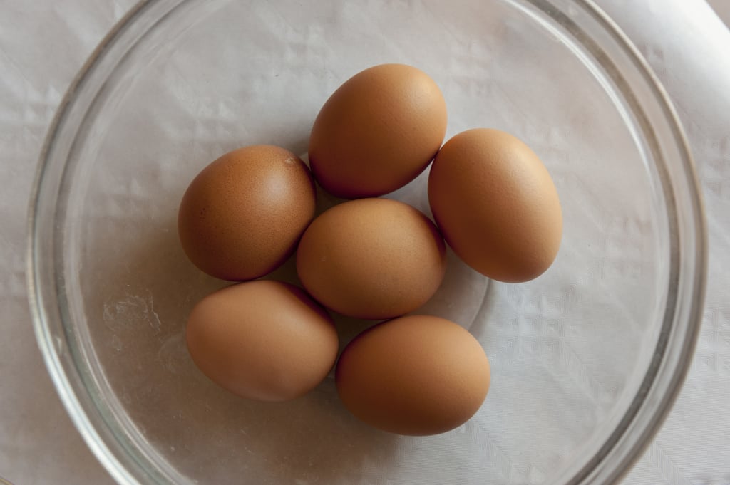 Start with eggs, flour, and a clean wooden work surface.