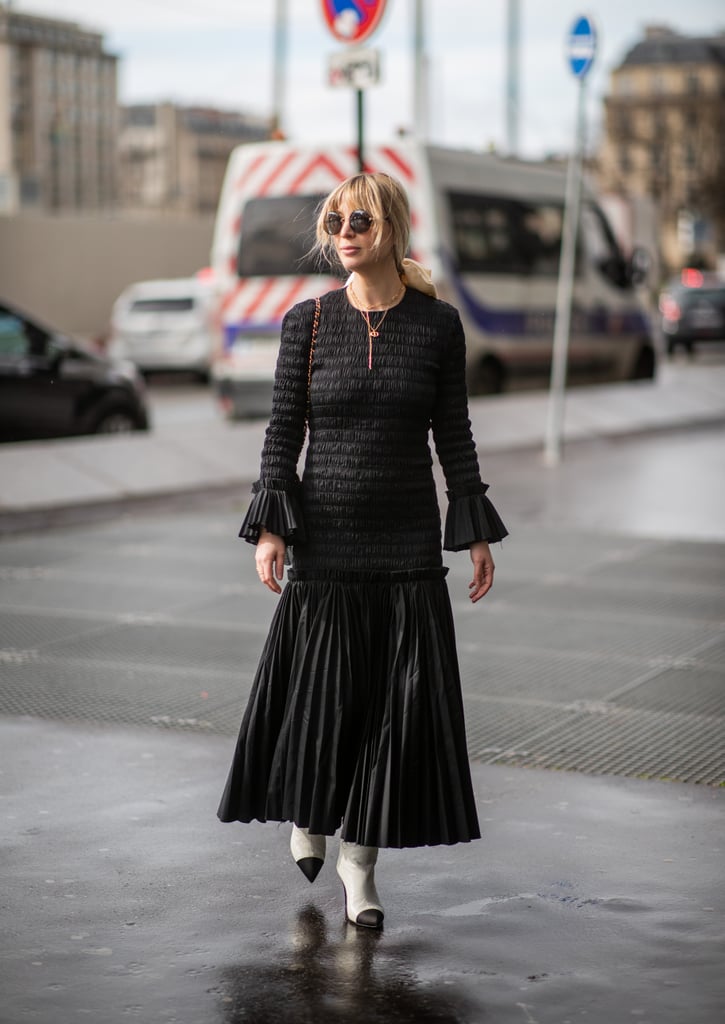 Style a pleated maxi with cap-toe boots.