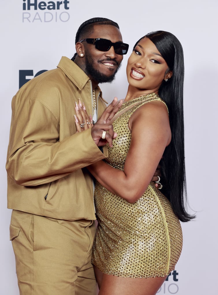 Ever since Megan Thee Stallion confirmed her relationship with Pardison "Pardi" Fontaine in February 2021, the couple have seemed to get more and more comfortable showing off their romance on social media. Pardi frequently gushes about Megan on his Instagram, and he previously celebrated her winning her first set of Grammys with a cute photo album. "BIG Ws !!!! .. REALLY AINT HEARING ALL THE OTHER SH*T ❤️🎱," the rapper captioned the pictures. 
The two made their red carpet debut as a couple at the iHeartRadio Music Awards in 2021, and they've been going strong ever since. In October 2021, the couple celebrated their one-year anniversary, and two months later, they celebrated Megan earning her college degree from Texas Southern University — talk about an exciting year! Since then, the pair have only celebrated more milestones, with Megan's sophomore album, "Traumazine," arriving in August. Later that month, she joined the MCU and guest starred in an episode of "She-Hulk."
Most recently, Megan shared an Instagram carousel that featured several photos of Pardi. The post started with a glimpse of the pair getting up close and personal while Pardi played video games, followed by one of Megan taking a selfie while Pardi wrapped his arms around her waist. Ahead, see more of the couple's cutest moments together.

    Related:

            
            
                                    
                            

            Megan Thee Stallion and Pardison Fontaine Turn JAY-Z&apos;s 40/40 Event Into Their Own Date Night