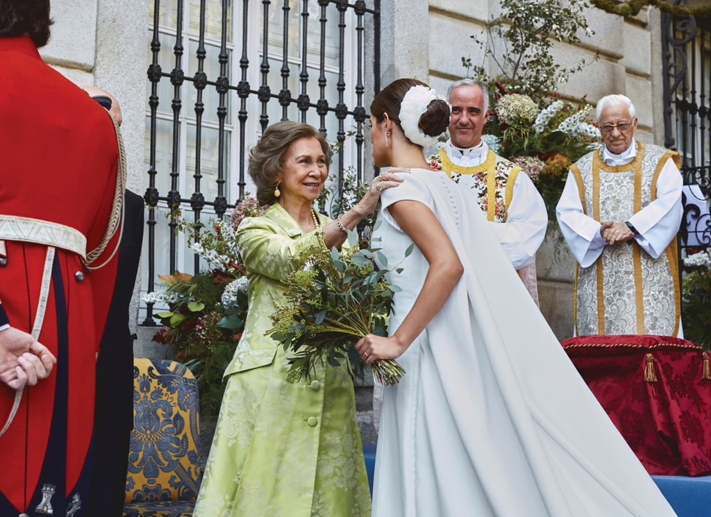 She Accessorized With a Feather Headpiece by Teresa Briz