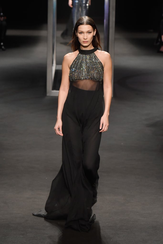 Wearing a sexy sheer gown at Alberta Ferretti.