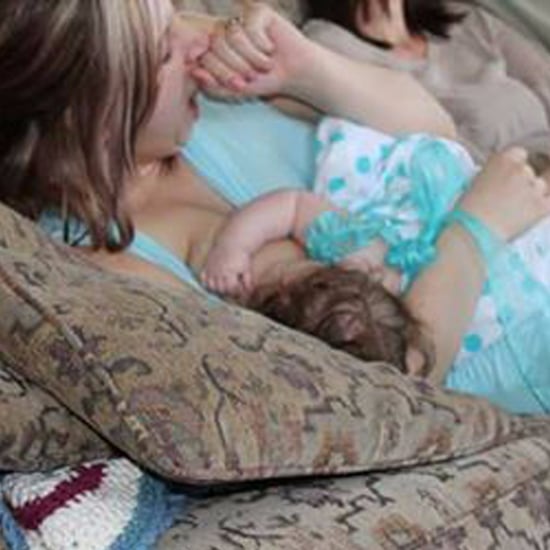 Photo of Mom Yawning While Nursing