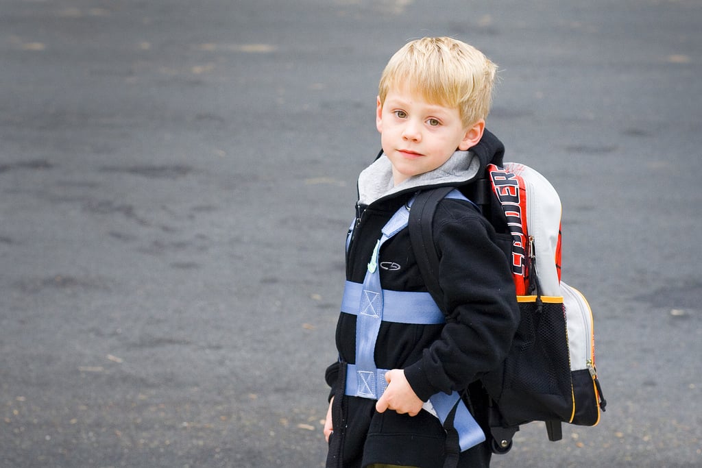 To the mom waiting by herself in her car while her child walks himself to school.
