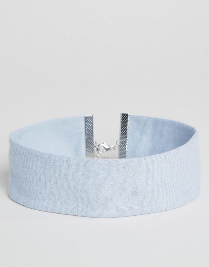 "I'm addicted to neckcessorizing but tired of the same ol' rotation of scarves and bandanas. This wide jersey choker from ASOS ($10) is a cute and on-trend way to mix things up while adding a small hint of color to neutral ensembles." — SS