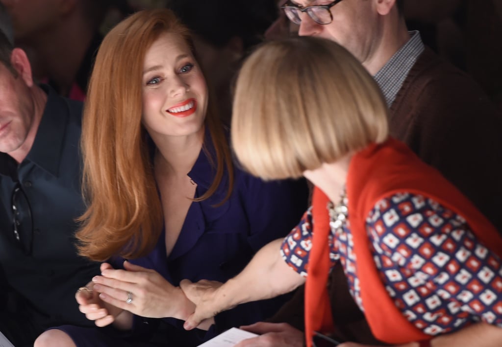 Amy Adams and Anna Wintour didn't let distance prevent them from chatting at the Max Mara show during Milan Fashion Week on Thursday.