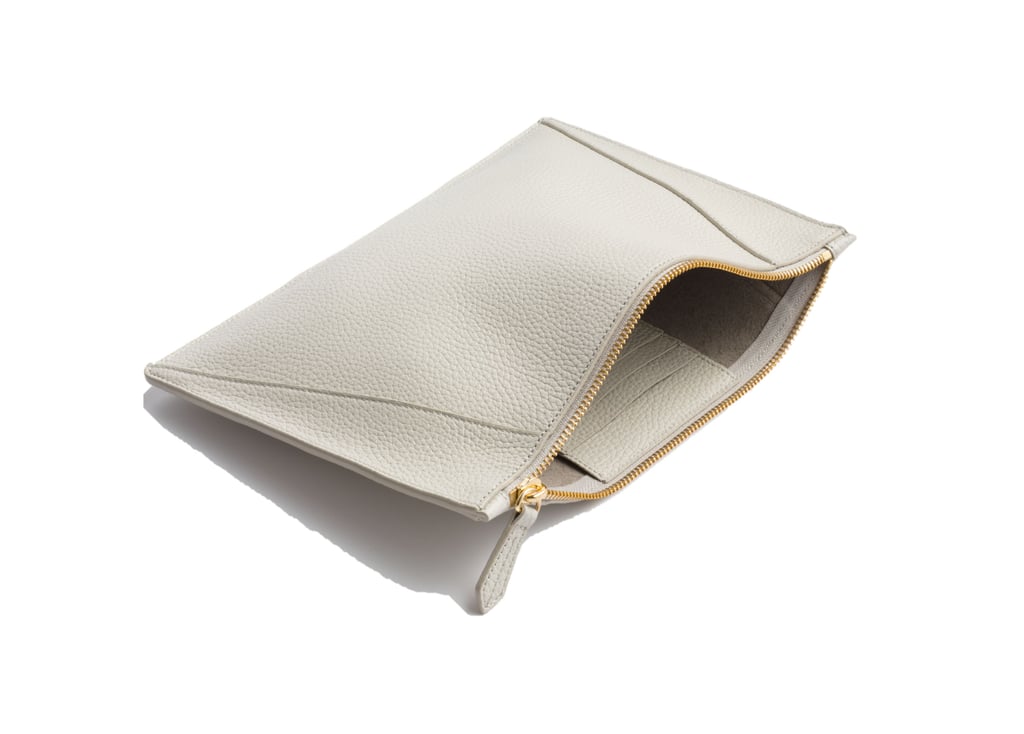 "Neely & Chloe bags look pretty standard, until you get your hands on them. These designs were built for function. (Don't even try to tell me you haven't wished for a card slot in your clutch.) The bonus? The entire collection is under $300, and I'm personalizing my pebble clutch ($118) with two stripes and my initials." — SW