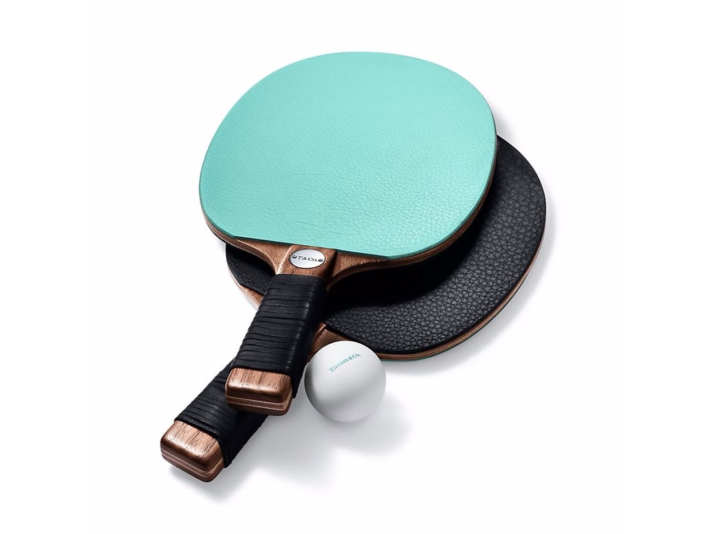 With their sterling silver accents and pops of Tiffany blue, these leather and reclaimed American walnut table-tennis paddles ($650) are almost too pretty to play with.