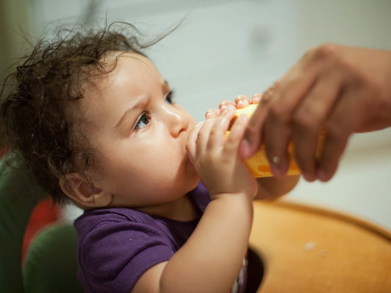 Evening feeding with Daddy, 2014