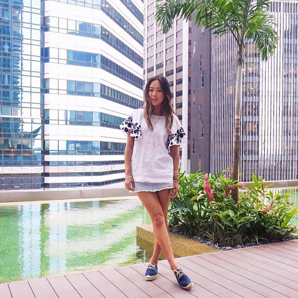 While we're all about Aimee Song's flouncy embroidered blouse, she added espadrille sneakers to complete the perfect errand-running outfit.
Source: Instagram user songofstyle