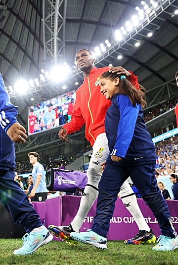 Why Do Soccer Players Walk Out With Kids?