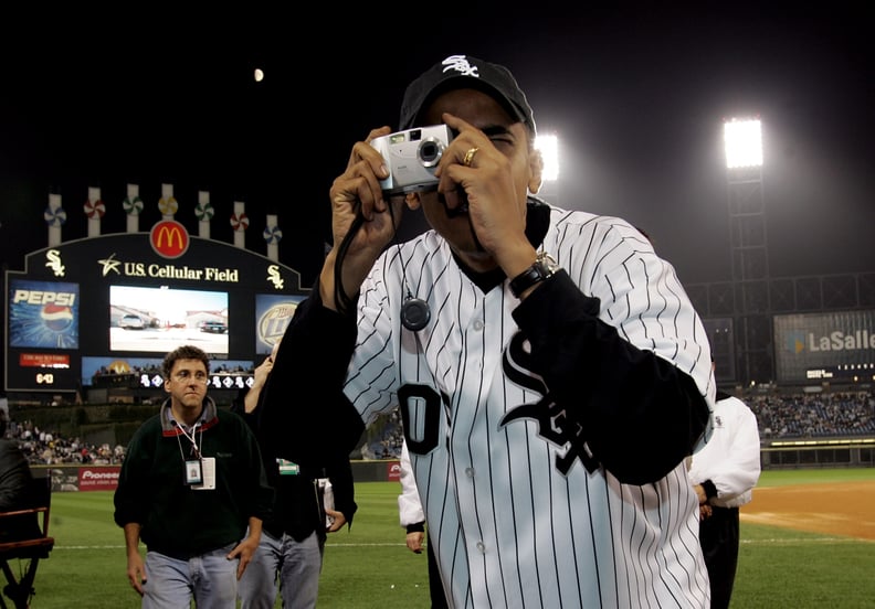 Snapping a picture at a White Sox game as a newly elected senator in 2005