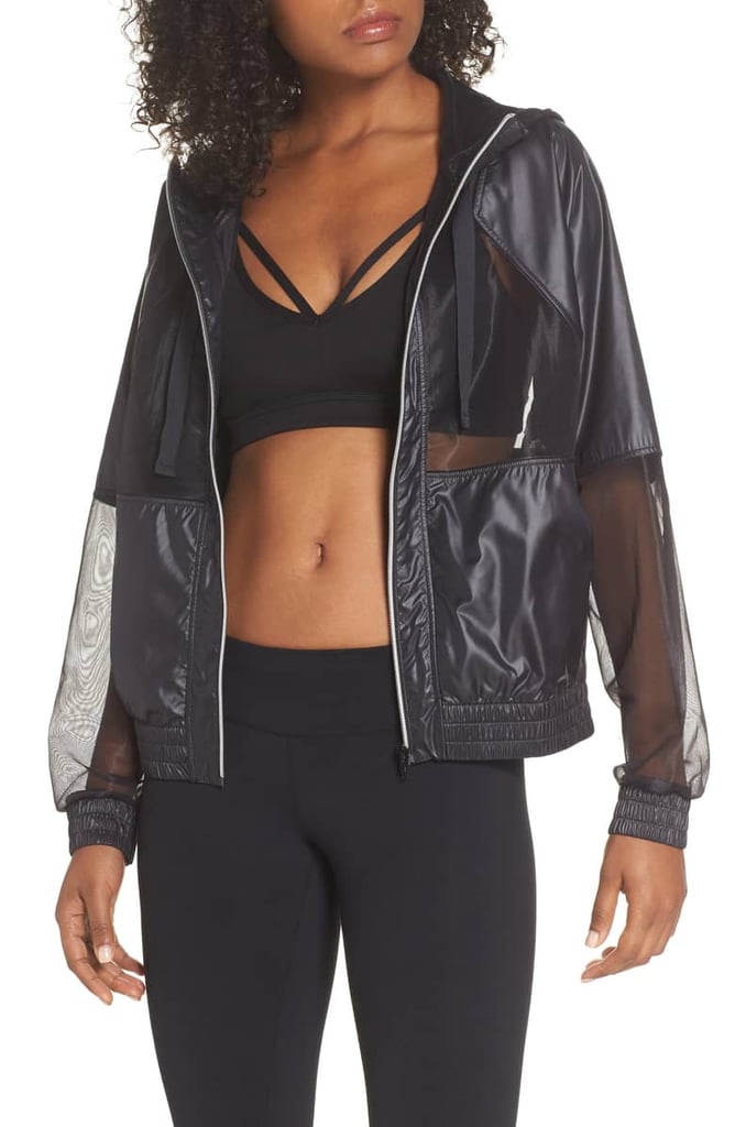 This jacket ($44) features sheer mesh panels for a unique take on transparency. Juxtapose the sporty piece with ultrafeminine, romantic dresses for a cool-girl effect.