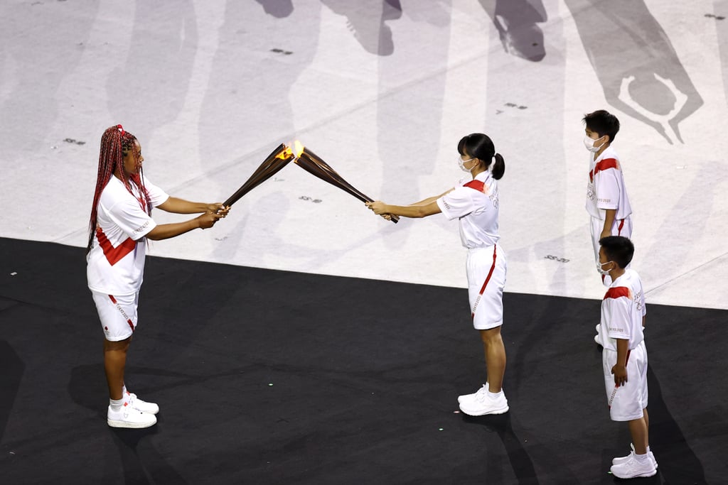 Naomi Osaka Carries Olympic Torch to the Olympic Cauldron