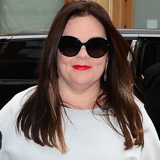 Melissa McCarthy Wearing Gray Outfit and Yellow Shoes