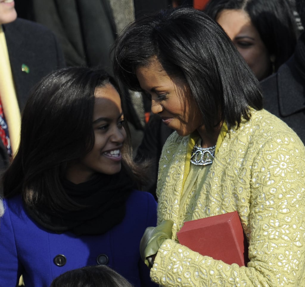 Michelle and Malia shared a moment at Barack's 2009 inauguration.