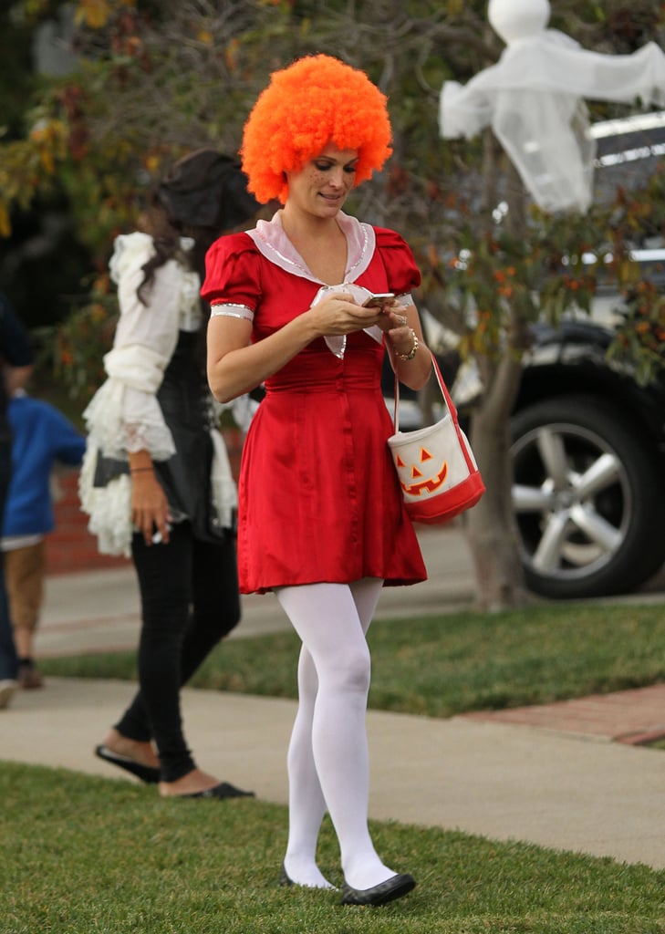 Molly Sims walked around LA as a grown-up version of Annie.
Molly Sims walked around LA as a grown-up version of Annie.