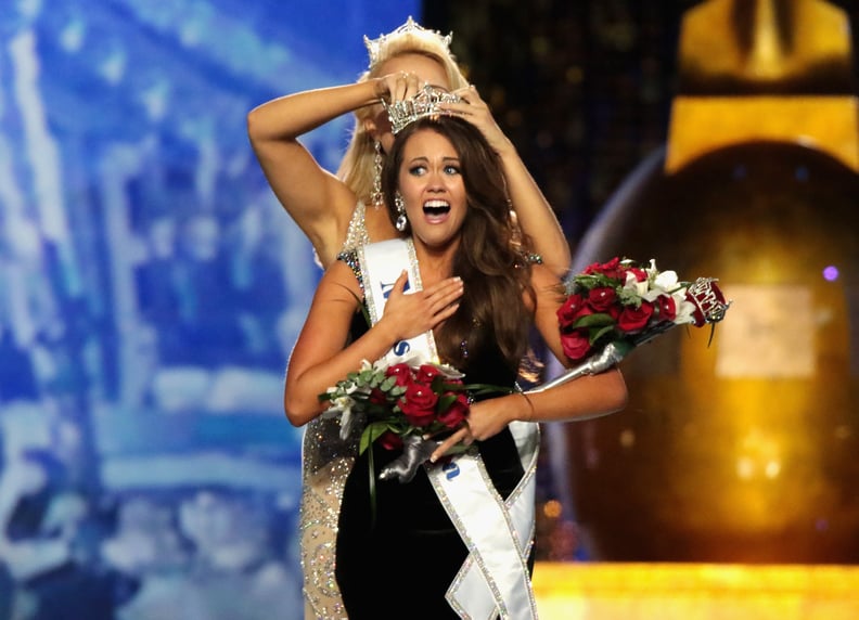 ATLANTIC CITY, NJ - SEPTEMBER 10:  Miss North Dakota 2017 Cara Mund is crowned as Miss America 2018 by Miss America 2017 Savvy Shields during the 2018 Miss America Competition Show at Boardwalk Hall Arena on September 10, 2017 in Atlantic City, New Jersey