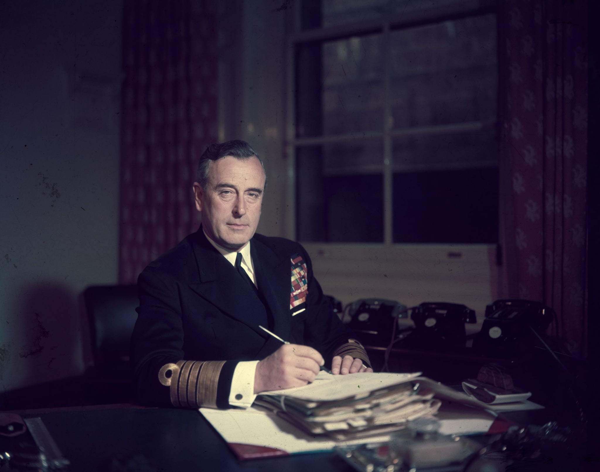 22nd April 1955:  First Sea Lord Louis Mountbatten, Earl Mountbatten, at his office in the Admiralty.  (Photo by Hulton Archive/Getty Images)