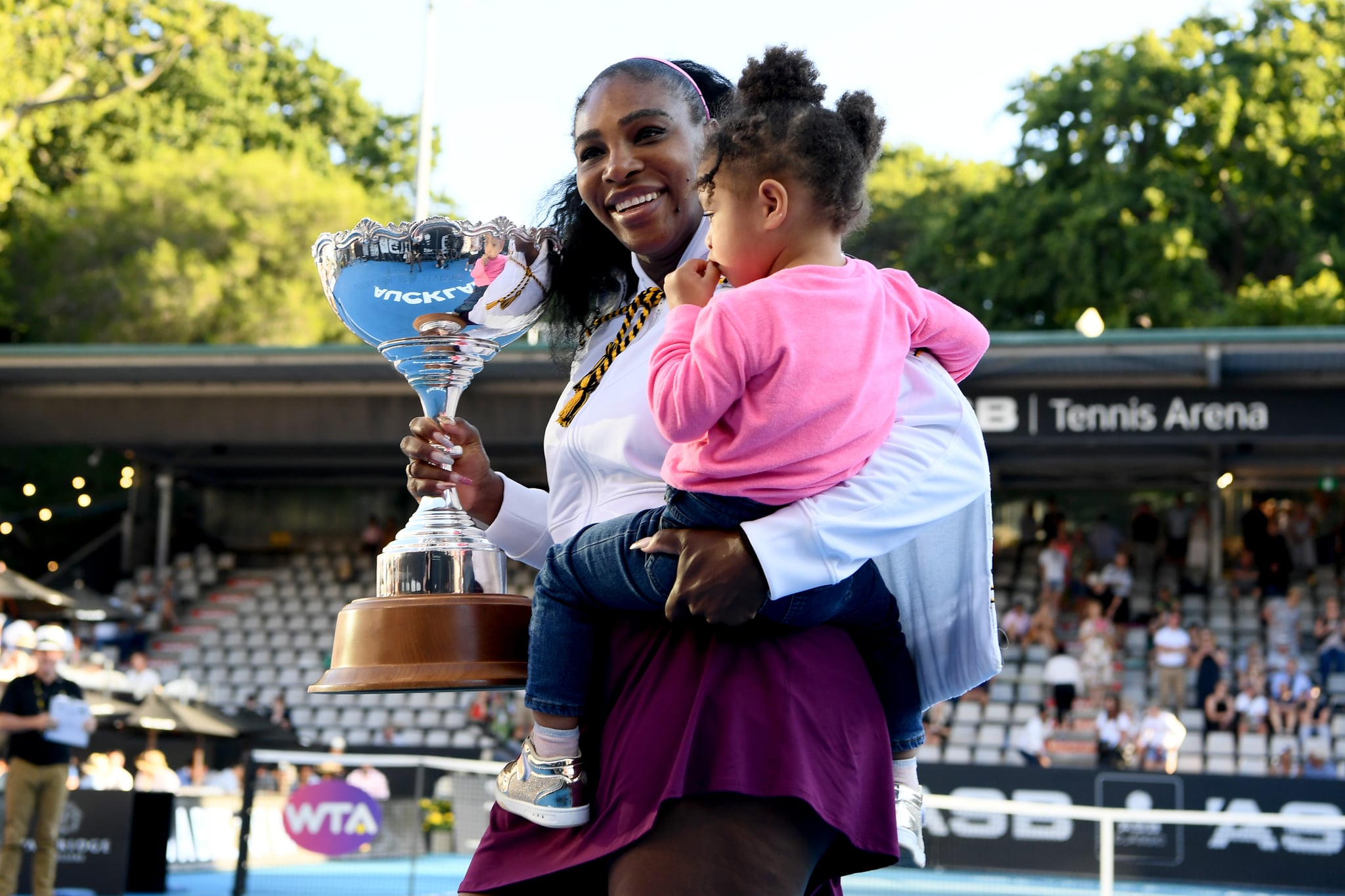 AUCKLAND, NEW ZEALAND - JANUARY 12:  Serena Williams of the USA celebrates with daughter Alexis Olympia after winning the final match against Jessica Pegula of USA at ASB Tennis Centre on January 12, 2020 in Auckland, New Zealand. (Photo by Hannah Peters/Getty Images)