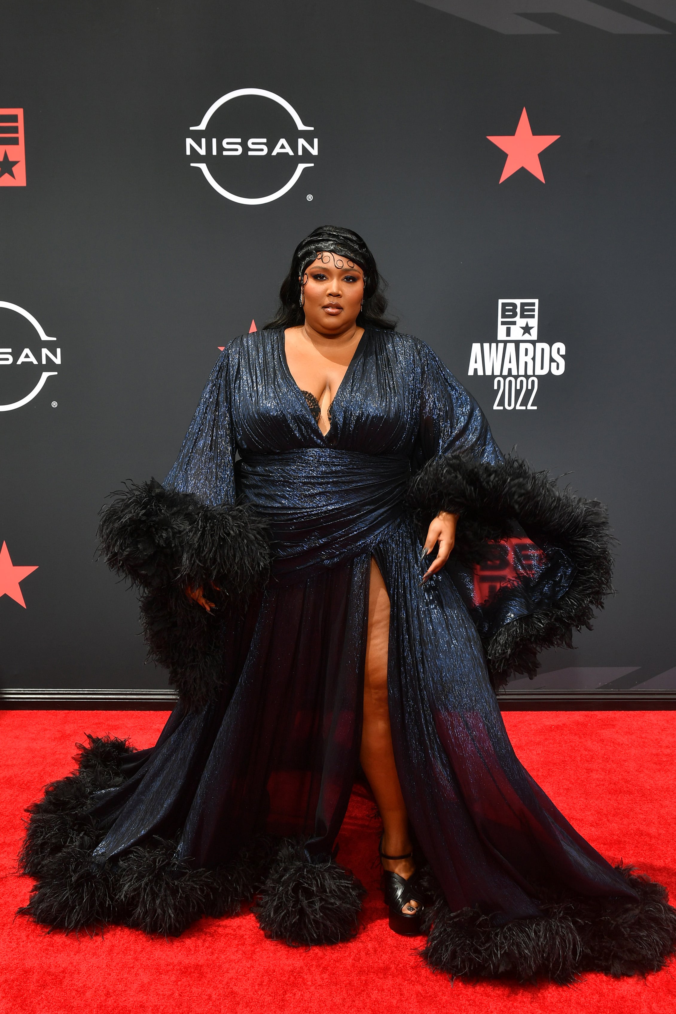 Lizzo Sparkles in a Sequined Cutout Bodysuit in About Damn Time -  POPSUGAR Australia