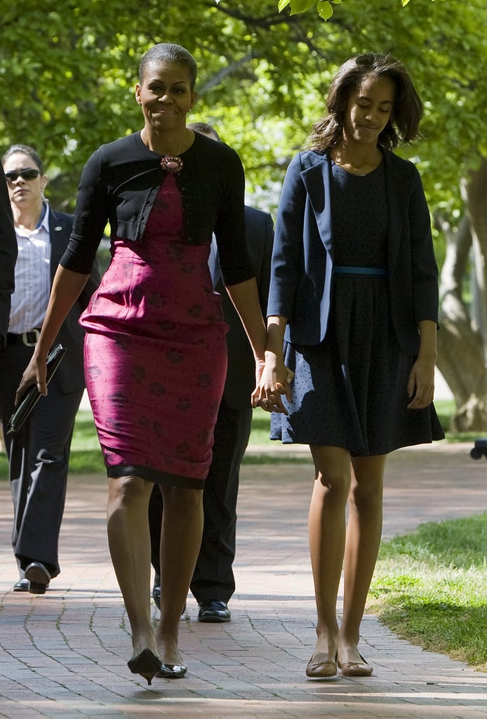 In 2012, Michelle and Malia held hands on the way to Easter services.
