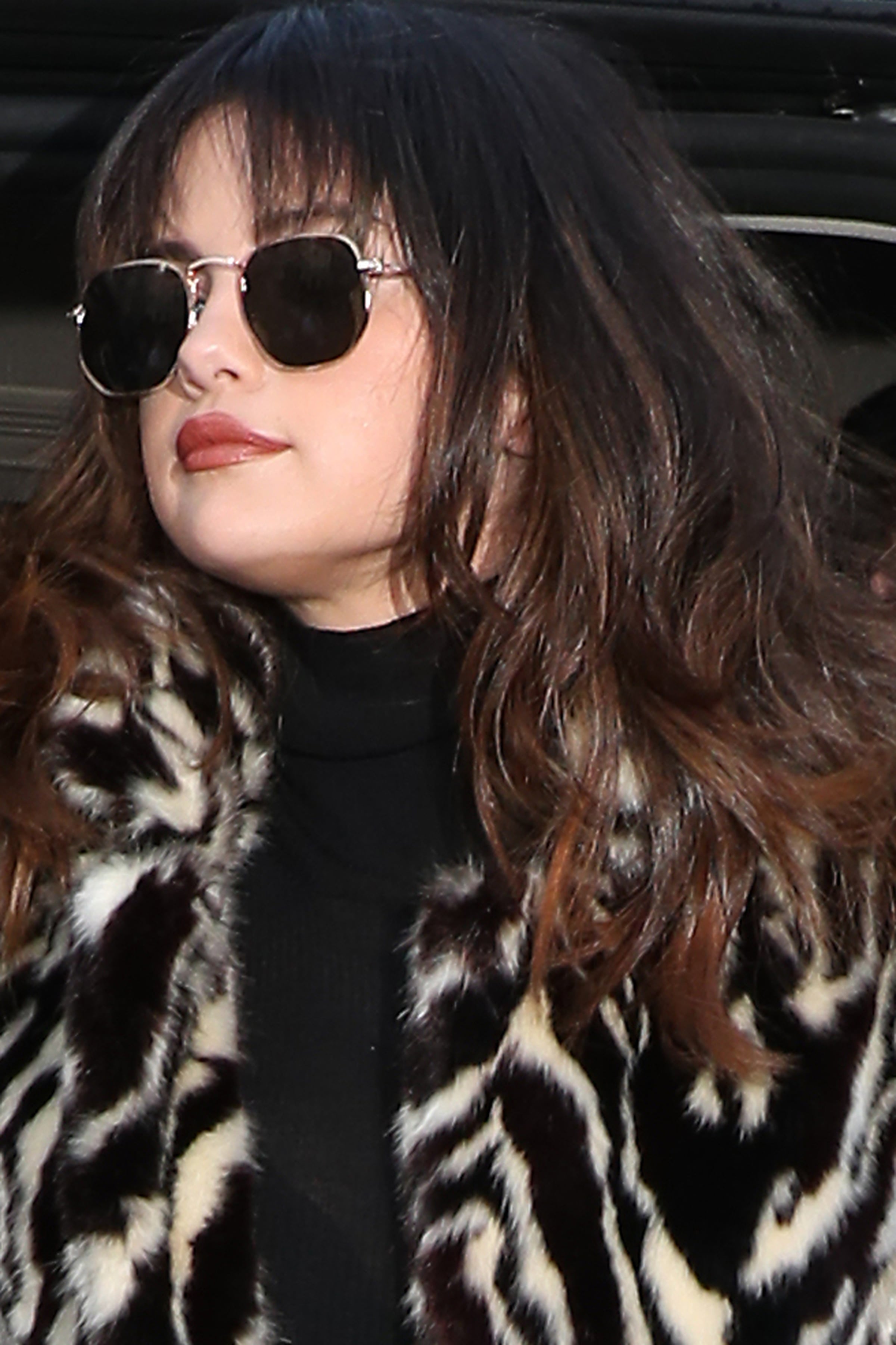 Selena Gomez Wore a $24 Leopard Print Top from Urban Outfitters