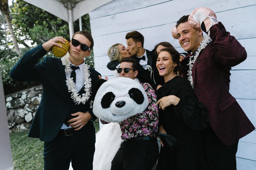 Couple Takes Wedding Photos in Bouncy Castle