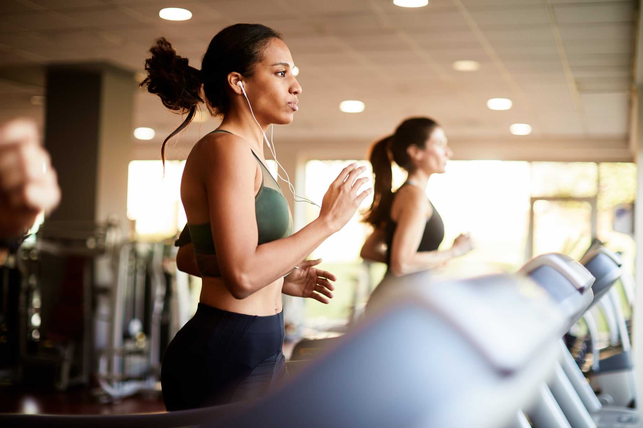 Woman on treadmill running.