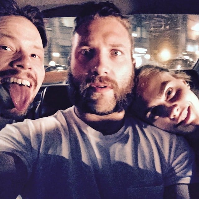 Ike Barinholtz and Delevingne flanked Courtney in a car.