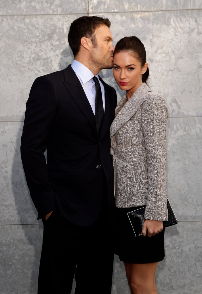 Brian planted a sweet kiss on Megan as they attended the Giorgio Armani fashion show in Milan, Italy, back in September 2010.