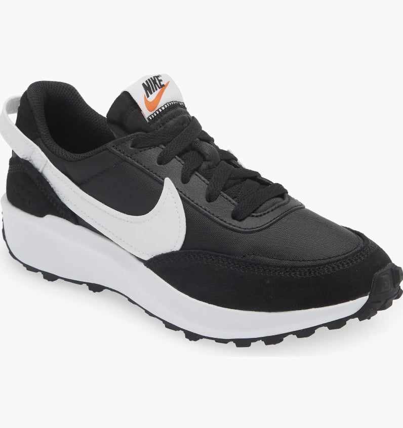 Nike Waffle Debut Sneakers ($75)
These stylish sneakers will take your outfit to the next level. The comfortable walking shoes come in seven seriously cute colorways, but we think the classic black sneakers will make the most functional addition to your wardrobe. Unlike other Nike silhouettes, this style is super lightweight, so they won't feel like they're weighing you down with each stride. Pair them with straight or wide-leg jeans or a crisp shirtdress for the breeziest ensemble.