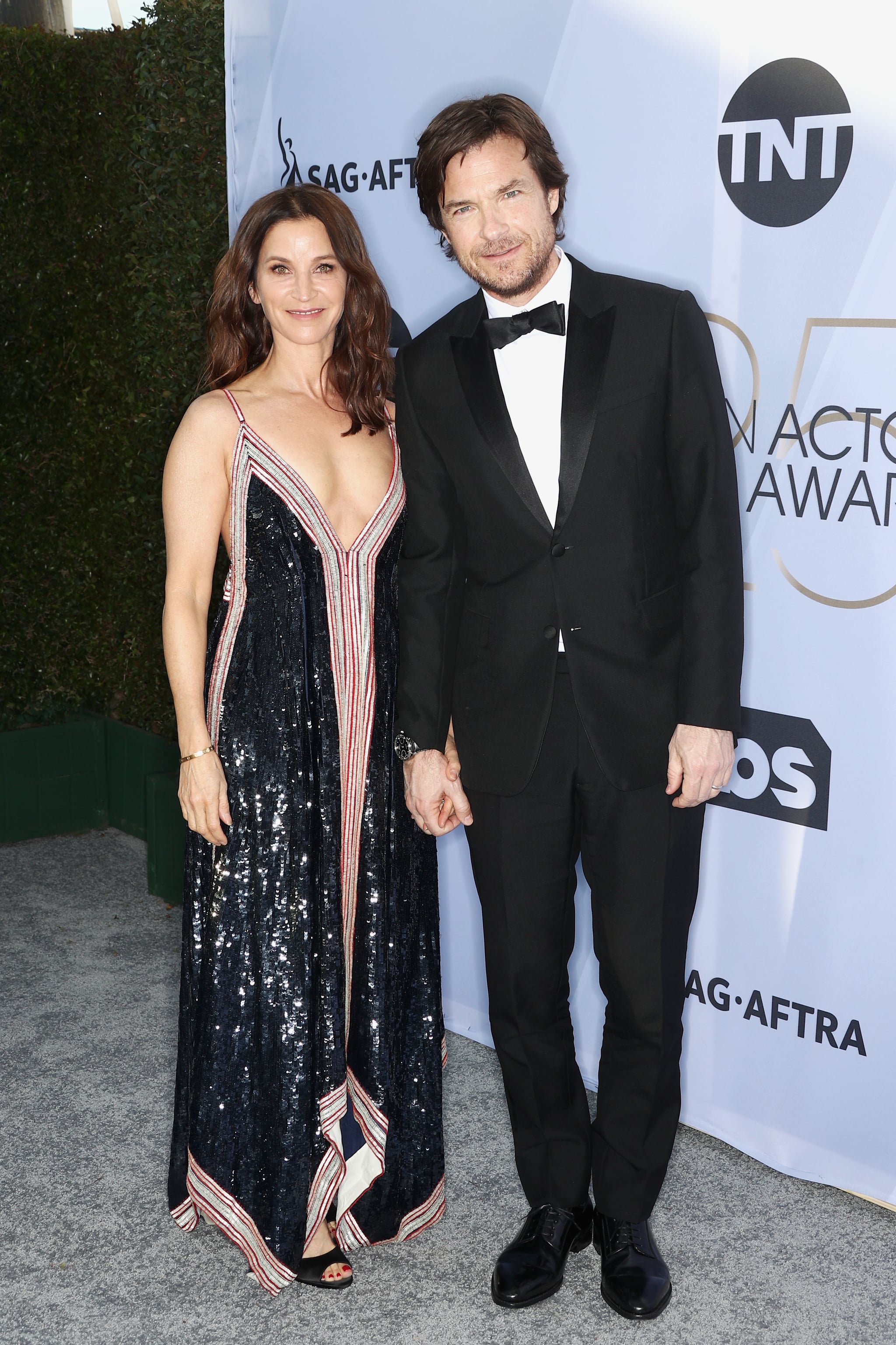 LOS ANGELES, CA - JANUARY 27: Jason Bateman (R) and Amanda Anka attend the 25th Annual Screen Actors Guild Awards at The Shrine Auditorium on January 27, 2019 in Los Angeles, California. 480695  (Photo by Frederick M. Brown/Getty Images for Turner)