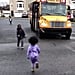 Sister and Brother Greet Each Other at the Bus Stop