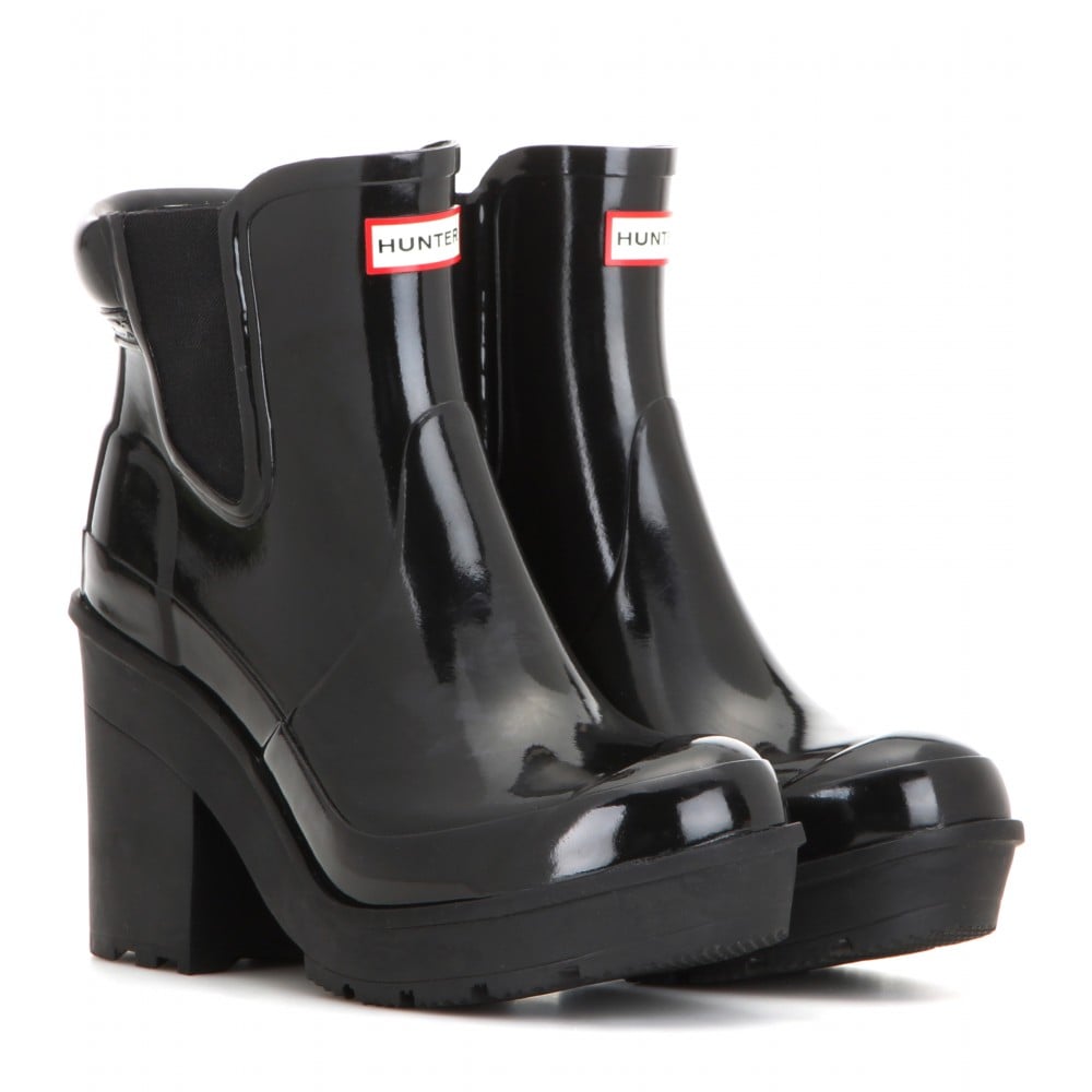 I love finding a piece that balances function and fashion, so when I came across the Hunter high-heel gloss rain boot ($204), it had my name written all over it.
— JC