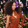 Zoe Saldana Quite Literally Dazzled in This Fiery Orange Gown at the Met Gala