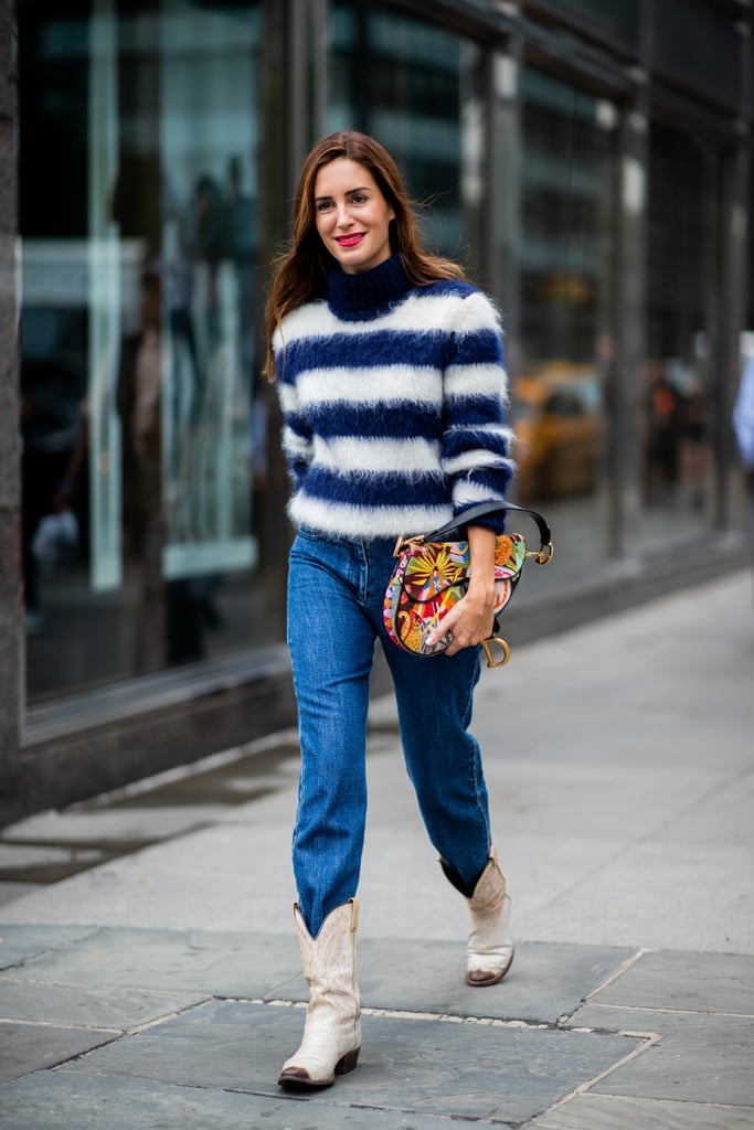 Go quirky-chic by teaming a striped sweater with jeans and tucking them into cowboy boots (like Princess Diana) with a printed bag to finish.